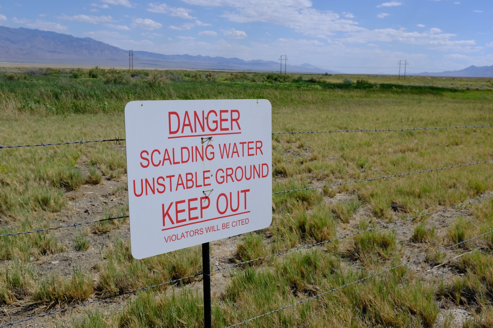 sign: danger scalding water unstable ground keep out